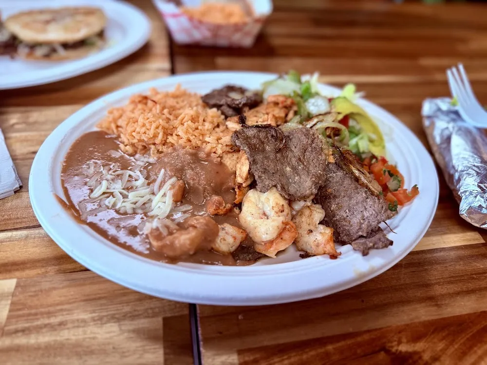 Steak Chicken and Shrimp Fajita